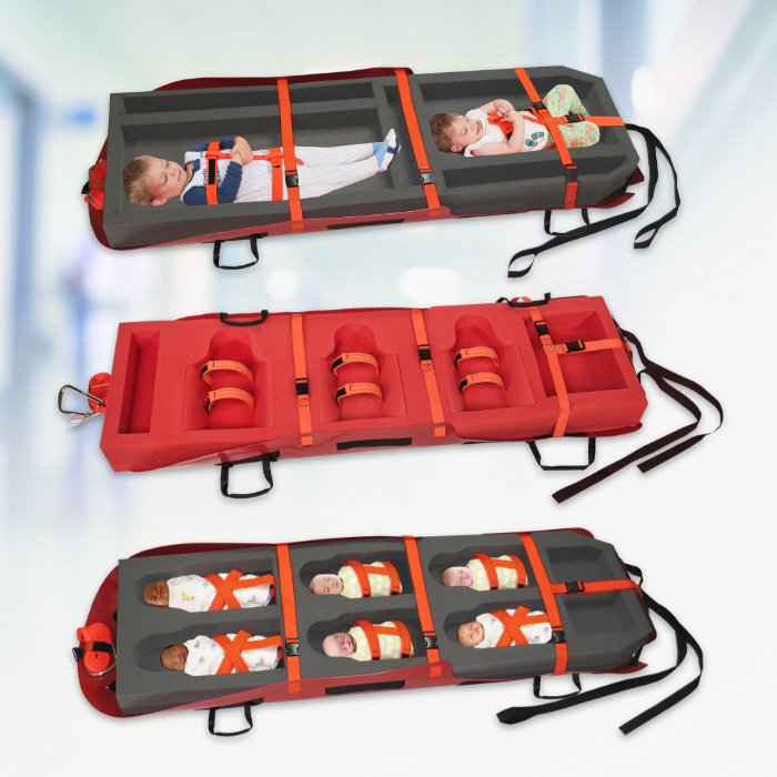Pediatric evacuation sleds with inserts for toddlers and infants.